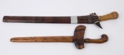 Two kris swords, Indonesian origin, 19th/20th century, the larger 63cm long overall - 2