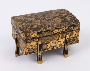 A Japanese jewellery casket, gilt floral decoration on metal, 20th century, three character mark to base, 8.5cm high, 14cm wide, 10cm deep