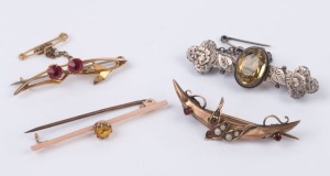 Four antique brooches, gold and silver set with stones, 19th and early 20th century, the largest 5cm wide