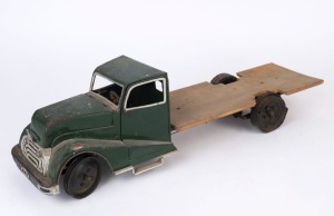 A scratch built flat bed lorry, aluminum, painted metal, wood and rubber tyres, circa 1935; incomplete, restoration project, circa 1935, 65cm long, 16.5cm wide