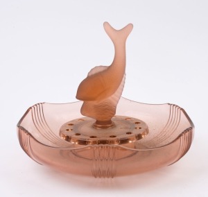 An English peach glass float bowl with fish centrepiece, circa 1930, 24cm high, 29cm diameter