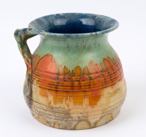 REMUED pottery vase with applied branch handle, incised "Remued", 17cm high, 20cm wide