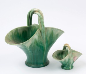 REMUED two green glazed basket vases, one incised "Remued", the other with foil label, the larger 26cm high