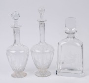 Three assorted antique and vintage decanters including an engraved ORREFORS example, the largest 30cm high