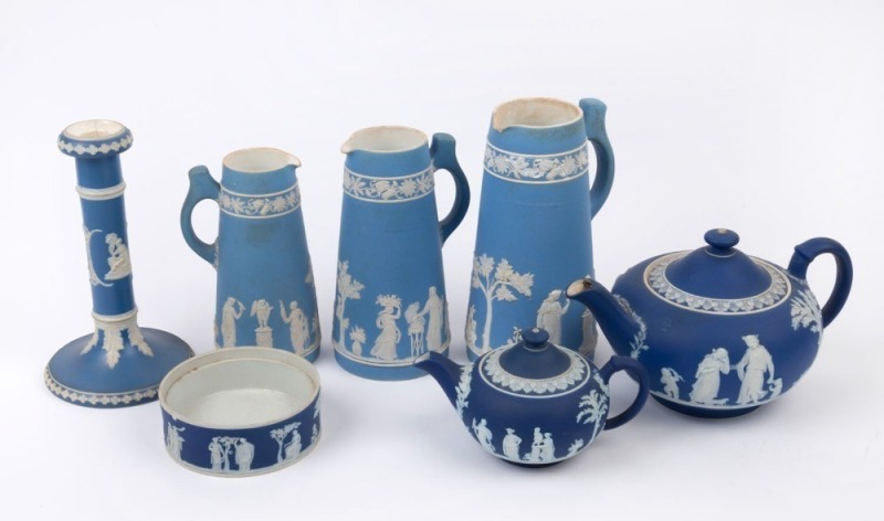 WEDGWOOD JASPER WARE collection of seven antique pieces including two teapots, three jugs, candlestick and bowl, A/F, 19th century, (7 items), the largest 22cm high