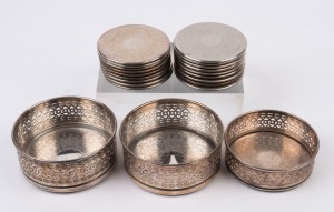 Three silver plated wine bottle coasters together with 18 silver plated coasters, 20th century, (21 items, the largest 5cm high, 11cm diameter
