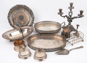 Silver plated three branch candelabra, assorted serving trays and dishes, silver plated coasters, cake slice, toast rack, candle holder and three bottle coaster, 19th and 20th century, the candelabra 31cm high
