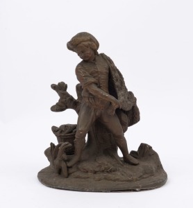 An antique statue of a fisherman, cast and patinated spelter, 19th century, ​​​​​​​23cm high