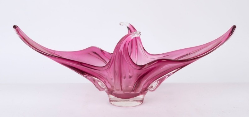 A Murano cranberry glass fruit bowl, circa 1960, 19cm high, 54cm wide