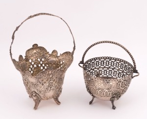 Two sterling silver pieced baskets, the larger 21cm high, 382 grams total
