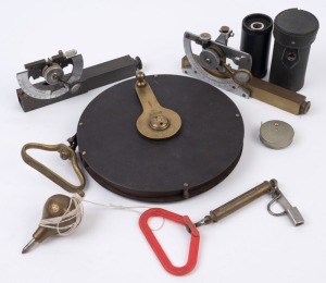 Surveyor's field equipment including, 66 foot field tape by Chesterman of Sheffield, one plumb bob, two Vernier clinometers (one stamped A.E. Parsons of Melbourne), pocket tape measure and spring balance, (6 items)