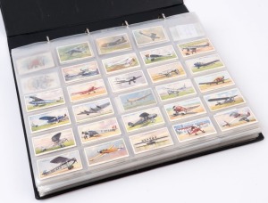 1900s-1930s British array of Wills or John Player cigarette cards with many largely complete or complete sets, with themes including aeroplanes, crests/arms, military uniforms & headdress, birds, wildlife, flowers, etc.; condition fair to VG. (1000+ cards