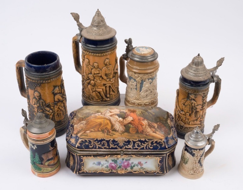 An antique Continental jewellery casket together with six assorted German steins including an antique Villeroy & Boch example, 19th and 20th century, A/F (7 items), the casket 27cm wide