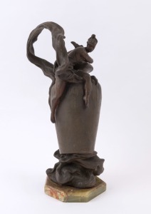 ANTON NELSON (France 1880-1910), Art Nouveau statue of a lady seated on a vase, cast and patinated spelter, circa 1900, signed "A. Nelson" on reverse, 38cm high