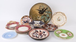 Antique porcelain warming plate, hand-painted charger, porcelain tazza and assorted antique porcelain dinner ware, 19th and early 20th century, A/F (21 items), the charger 36cm diameter