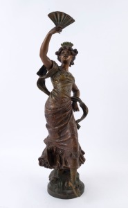 An antique French patinated spelter statue of a lady holding a fan, late 19th century, signed "Moreau", ​​​​​​​59cm high