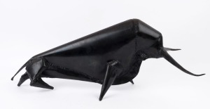 An Italian metal bull statue with black painted finish, 20th century, ​​​​​​​33cm high, 82cm long