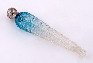 An antique cut crystal scent bottle with silver lid, 19th century, 20.5cm high