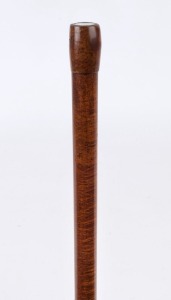 An antique "Gambling" walking stick, handle inset with glass compartment housing three bone dice, fiddleback shaft and brass ferrule, ​​​​​​​82cm high