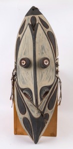 An ancestor spirit mask, carved wood, shell, fibre and pigment, Papua New Guinea, ​​​​​​​81cm high