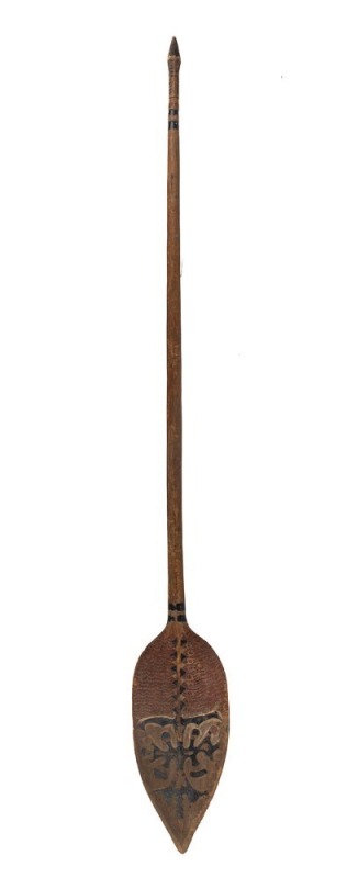 A tribal canoe paddle, carved wood with remains of painted finish, Papua New Guinea, ​​​​​​​180cm high