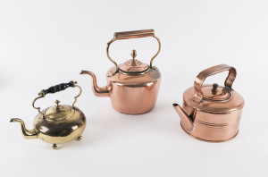Three antique copper and brass kettles, 19th century, the tallest 29cm high