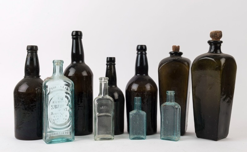 Nine assorted antique medicine and alcohol bottles, 19th and early 20th ...