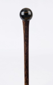 A walking stick, spherical tiger's eye handle with palmwood shaft and metal ferrule, 94cm high