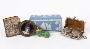 BILSTON enamel cloak peg with female portrait, 18th century; together with a coin purse, a sterling silver "Chorus Of Angels" miniature book, a WEDGWOOD jasper ware trinket box, and "The Worlds Smallest Doll", (5 items), ​​​​​​​the trinket box 10cm wide