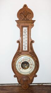 An antique oak cased banjo barometer with mercury thermometer, late 19th century, 92cm high