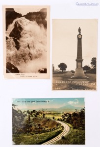 POSTCARDS - AUSTRALIAN STATES - SOUTH AUSTRALIA & QUEENSLAND: Single volume collection with South Australia cards (approx 140) with an approximate 60/40 split of earlier and later (post 1960) cards, with older cards including 'Coast & Jetty from North Edithburg', 'Elder Park, Adelaide', 'Parade, Norwood'; Queensland cards (approx 90) nearly all modern, few older including 'Horse Shoe Bend, Cairns Railway' & real-photo 'Stoney Creek Falls'; condition variable. (230 approx).
