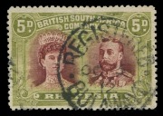 Rhodesia: 1910-13 (SG.143a) 5d lake-brown & green Double Head perf.14, fine used with large-part 'REGISTERED/BULAWAYO' datestamp, Cat. &pound;1600. Rare shade. Brandon Certificate (2002)