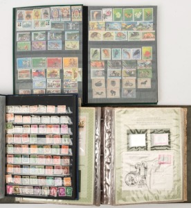 REST OF THE WORLD - General & Miscellaneous Lots: 1890s-2000s array in two stockbooks with lots of 1980s-2000s PNG commemorative sets, also Norfolk Island & New Zealand, amongst many other countries; some thematic content including 'Birds' & 'Royalty; also 1981-83 International Society of Postmasters presentation set of 36 FDCs plus stamp & replica in silver; climate-related condition issues (latter item in poor condition, silver replicas salvageable); inspection is advised.
