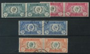 SOUTH AFRICA: 1935 (SG.65a-68a) Silver Jubilee set in bilingual pairs, the left side unit of each pair with variety 'CLEFT SKULL', fine used, Cat. &pound;383+. (4 pairs)