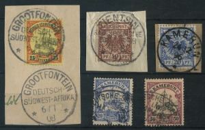 GERMAN COLONIES: POSTMARKS: with POs in CHINA complete strike of 1897 'TIENTSIN/KAISERL.DEUTSCHE/POSTAGENTUR' datestamp tying 50pf chocolate 'Reichpost' Arms to piece (Cat. £65); CAMEROUN complete 1896 'KAMERUN' datestamp tying 20pf dull blue 'Reichpost' Arms to piece (Cat. £100); GERMAN SOUTH-WEST AFRICA complete strike of 1908 'GROOTFONTEIN' tying 25pf Yacht to piece, plus 2 other items. (5)