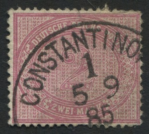 GERMAN COLONIES: GERMAN POs in TURKISH EMPIRE: 1885 (SG.Z33b) large-part strike of 1885 'CONSTANTINOPLE' datestamp on German 2Mk dull rose Numeral; few nibbed perfs, Cat. £600.