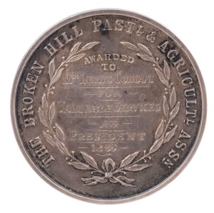 BROKEN HILL PASTORAL & AGRICULTURAL ASSOCIATION: silver medallion by A.M. Wittenbach, with inscription 'AWARDED TO/MR LEWIS COHOUN/GO/VALUABLE SERVICES/AS/PRESIDENT/1899', diameter 50mm, weight 65.5gr.
