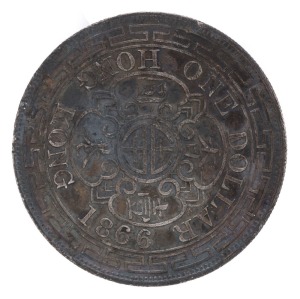 Coins - World: Hong Kong: 1866 (KM #10) silver dollar, few rim dings, blackish patina, high level of detail remaining; 38mm diameter, weight 27g; aVF.