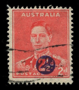 AUSTRALIA: Other Pre-Decimals: 1941 (SG.200b) KGVI Surcharged 2½d on 2d scarlet error SURCHARGE MISPLACED, few nibbed perfs, tidy machine cancel; BW:222cc - Cat. $375.