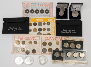 Coins - World: World Selection with USA uncirculated 1994 Silver Proof sets (2) in original packaging, 2000 Walking Liberty 1 troy oz 999/1000 dollars (3), three 1979-99 Susan B. Anthony $1 coin sets of 3; also circulated coin sets with CHINA cash currency 1644-1909 set of 10 coins, plus Macau (2) & Thailand (2) mixed selections on cards, and two other items. (15 items)