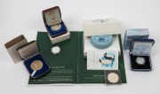 Coins - Australia: Silver: Selection with 1982 Brisbane Commonwealth Games $10 proof, 1993 $1 proof, 1992 Penguins $10 piedfort proof; plus 1970 State Savings Bank Captain Cook Bicentenary medallion; also uncirculated Yemen 1965 1r Churchill & Kiribati 20