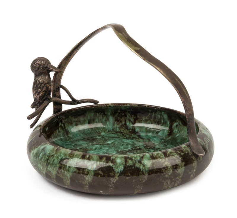 "DISABLED SOLDIER'S POTTERY" bowl with mottled green glaze, organic form silver plated branch handle adorned with a kookaburra, circa 1920, monogram stamp to base, 15cm high, 30cm diameter