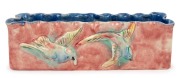 CASTLE HARRIS pottery flower trough with two applied flying birds, glazed in pink and blue, incised "Castle Harris", 10cm high, 31cm wide