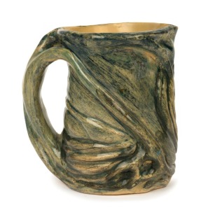 MERRIC BOYD pottery jug with applied windswept tree decoration, incised "Merric Boyd, 1946", 13cm high, 14cm wide