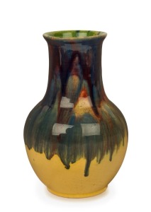 P.P.P. (PREMIER POTTERY PRESTON) baluster shaped pottery vase, yellow ground with blue, pink and green glaze, stamped "P.P.P.", 21.5cm high