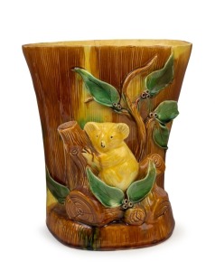 An impressive Australian pottery tree stump vase with applied koala, gumnuts and leaves, most likely Sydney origin, 25cm high, 24cm wide