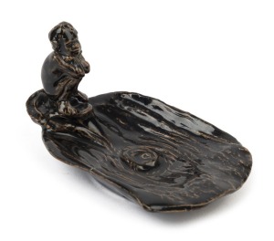 WILLIAM RICKETTS early pottery tree stump dish with squatting Aboriginal figure, unusual black glaze, incised "W. M. Ricketts, Melbourne, 1936", 7cm high, 12.5cm wide