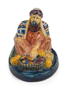 VALERIA CORRELL "Seated Arab" pottery statue, 14.5cm high