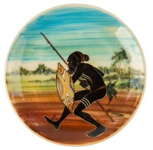 MARTIN BOYD pottery plaque with Aboriginal warrior, incised "Martin Boyd, Australia", 26.5cm diameter