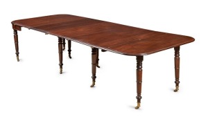 GILLOWS Georgian mahogany extension dining table with fold-over top and concertina undercarriage, eight turned and tapered gun barrel legs with original brass castors, accompanied by mahogany extension leaf holder and four extension leaves, circa 1810, 75cm high, 53cm wide (extends to 318cm), 120.5cm deep